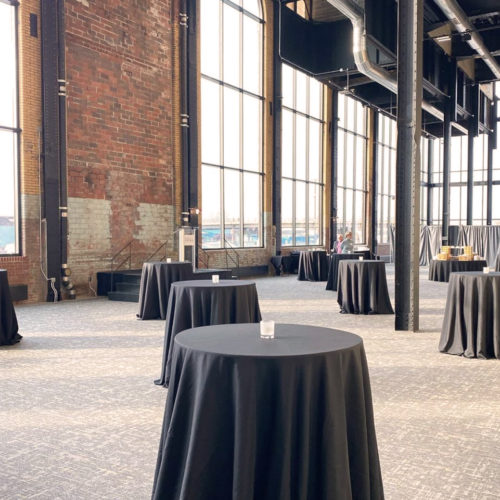 Cocktail tables setup for an event and the Powerhouse